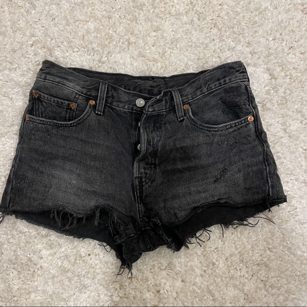 Distressed denim Levi shorts.